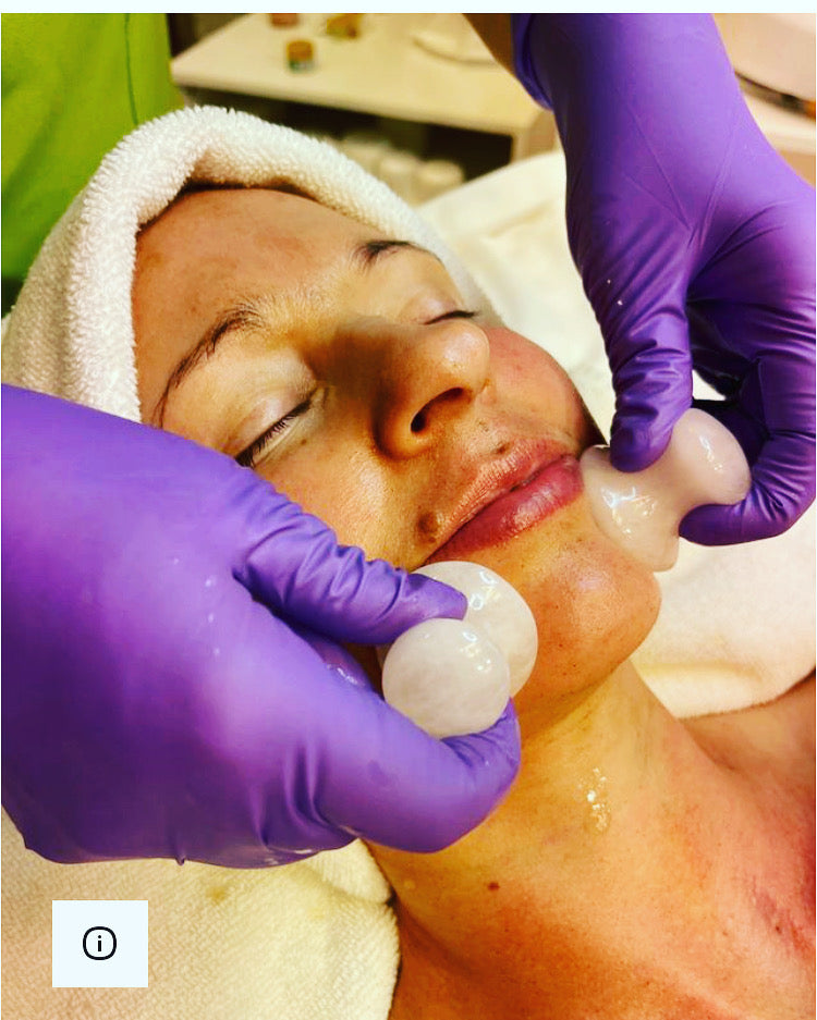 an organic facial treatment being done on a young woman