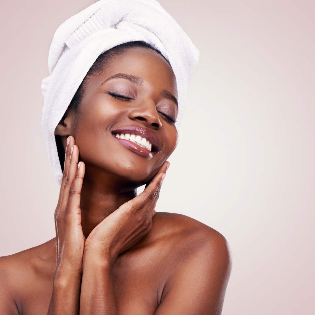 The skin rejuvenation bundle featuring a chest up photo of a young woman with a towel wrapped around her hair